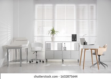 Doctor's office interior with modern workplace in clinic - Shutterstock ID 1632875644