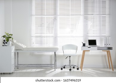 Doctor's office interior with modern workplace in clinic - Shutterstock ID 1637496319