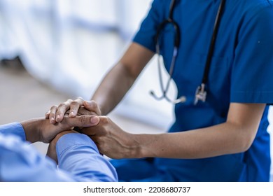 Doctors and patients consult and diagnose, sit and talk. at the table near the window in medical health concept - Shutterstock ID 2208680737