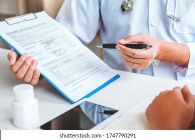 Doctors And Patients Consulting About Treatment Guidelines At Office