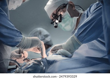 Doctors perform surgery cardiac stent transplant in a hospital - Powered by Shutterstock