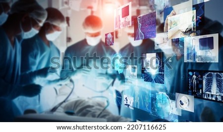Doctors performing surgery and medical technology. Medtech. VR surgery. Wide angle visual for banners or advertisements.