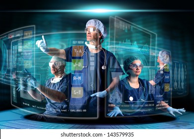 Doctors In A Research Station With Digital  Screens And Keyboard