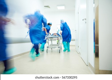 Doctors running for the surgery