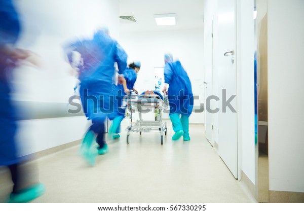 Doctors running for the\
surgery
