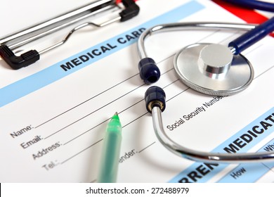 Doctor's Stethoscope On The Medical Card