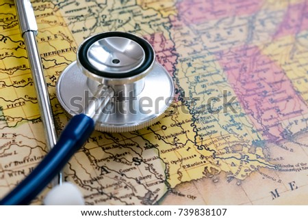 Doctor's stethoscope over USA, healthcheck. Concept doctors without borders. May be used for political issues, financial, health care issues, crisis or the like.