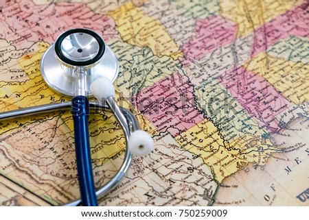 Doctor's stethoscope over USA, healthcheck. Concept doctors without borders. May be used for political issues, financial, health care issues, crisis or the like.