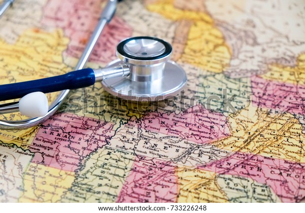 Doctor\'s stethoscope over USA,\
healthcheck. Concept doctors without borders. May be used for\
political issues, financial, health care issues, crisis or the\
like.