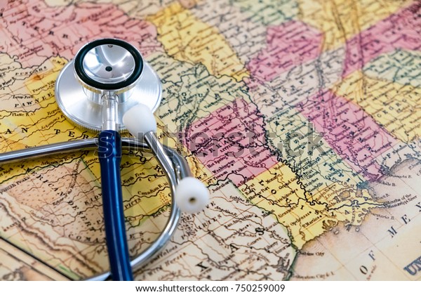 Doctor\'s stethoscope over USA,\
healthcheck. Concept doctors without borders. May be used for\
political issues, financial, health care issues, crisis or the\
like.