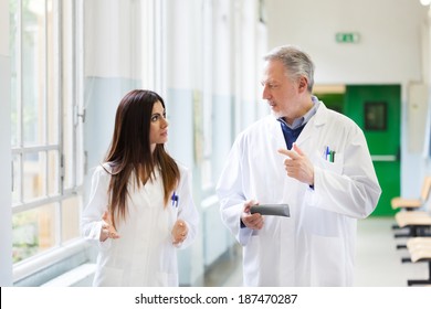 Doctors Talking In An Hospital