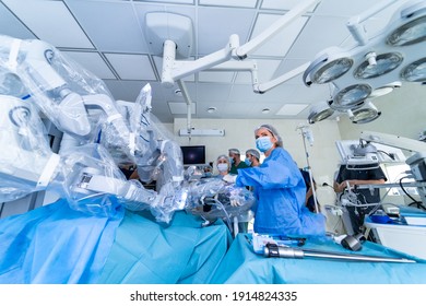 Doctors Use Robotic Equipment In Modern Operating Room. Medics Provide Neurosurgery Operation. Futuristic Medicine.