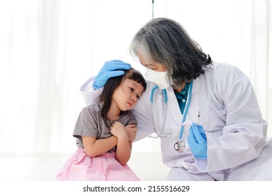 Doctors vaccinate girls to prevent coronavirus. Concept of medical services. prophylactic vaccine - Shutterstock ID 2155516629