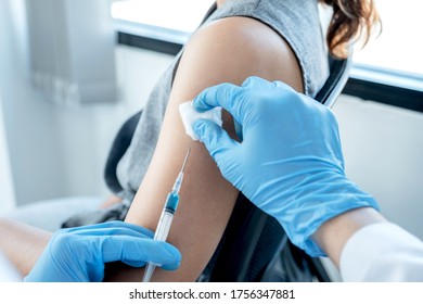 doctors vaccinated with syringes to prevent epidemics at hospitals, health care and medical concepts. - Shutterstock ID 1756347881