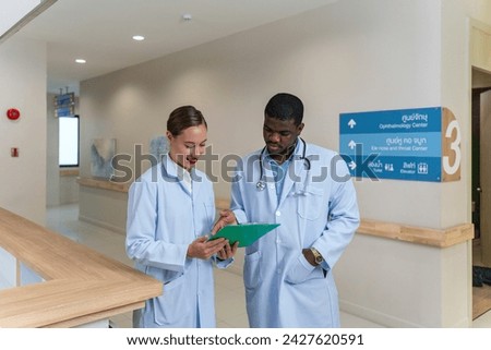 Doctors working together discussing solution and idea for a medical case in a hospital