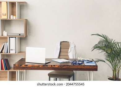 Doctor's Workplace In Interior Of Modern Medical Office