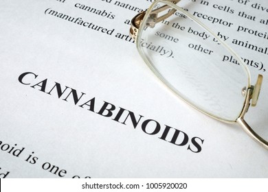 Document about Cannabinoids on a desk.