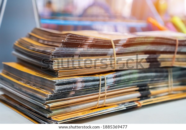 Document brochure informative paper documents also\
used for advertising that can be folded into template,Â pamphlet\
orÂ leaflet. Stacks of booklet business report papers on desk in\
modern office