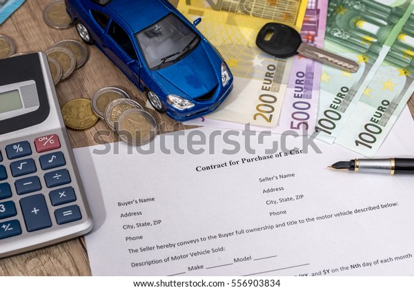 document - buying a car with euro, pen, calculator
and toy car.