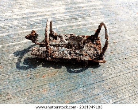 document clamp in a rusty folder