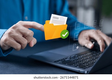 Document file data successfully uploaded, submitted, approved. Businessman uses laptop to upload folder files to cloud.