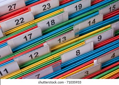 Document folders sorted for archive with colors and numbers
