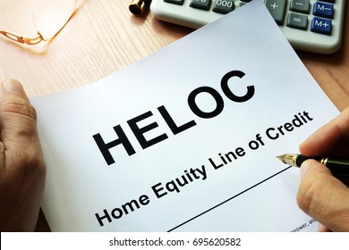 Document HELOC Home Equity Line Of Credit On A Table.