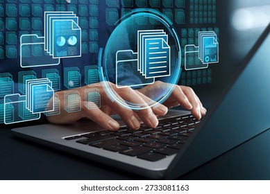Document and knowledge management systems. Automated text data classification. Businessman using laptop computer to access database.