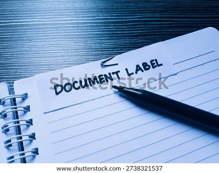 Document label writting on table background. 