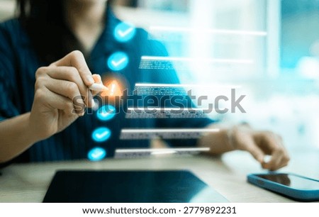 Document management checklist concept with virtual interface. Professional woman using stylus on tablet for digital file verification, checking task list, and identifying system alert for accuracy