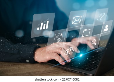 Document Management Concept, Businessman Working With Laptop Computer And Management Icons On Virtual Screen Make A Plan For Secure Data Storage