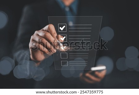 Document management system, Checklist concept.  DMS. Assessment form, questionnaire, clipboard management. Businessman working productivity checklist, tick correct mark to complete online survey form.