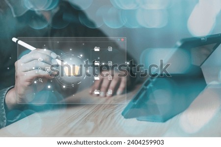 Document Management System (DMS) being setup by IT consultant working on digital tablet. Software for archiving, searching and managing corporate files and information,Digital asset handle, Document.