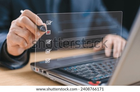 Document management system DMS. Business assessment form, Wrong and right survice questionnaire, checklist audit task form. Businessman work on laptop computer screen, fill survey form online. 
