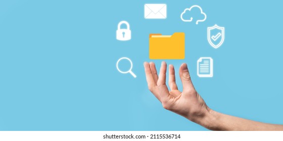 Document Management System DMS .Businessman hold folder and document icon.Software for archiving, searching and managing corporate files and information.Internet Technology Concept.Digital security.