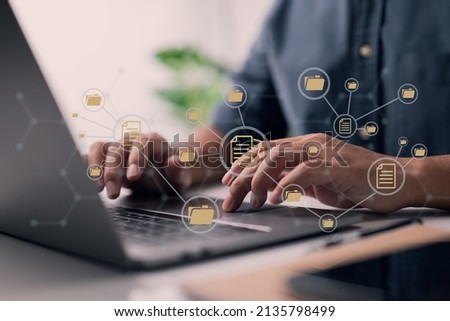Document Management System, or DMS for short. A laptop is being used by an IT consultant. Theoretical Model of the Internet. Information file management and archiving automation software.
