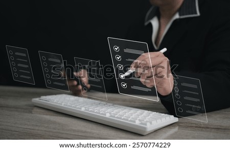 Document Management System (DMS) and task management. assessment forms, questionnaires, checklists,efficient task tracking. Businessman using laptop for checklist, and filling out a survey form online