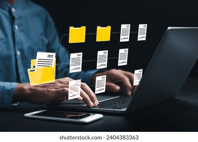 Document management system (DMS) technology, Businessman using laptop with database folder online to store files document data digital. file storage process with security. 
