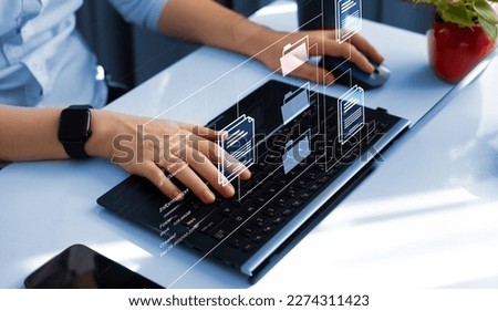 Document Management System or DMS.Automation software to archiving and efficiently manage and information files.Consultant information technology (IT) working on laptop.