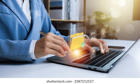 Document Management System (DMS),Businessman using a laptop searching folder and managing files paperwork.Software for archiving,share online database server, administration employee in enterprise.