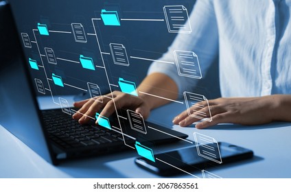 Document Management System or DMS.Consultant information technology (IT) working on laptop.Automation software to archiving and efficiently manage  and information files.Internet Technology Concept. - Shutterstock ID 2067863561