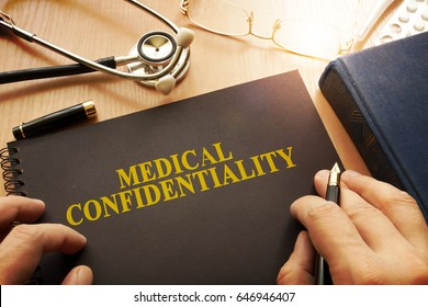Document with name medical confidentiality on a table.