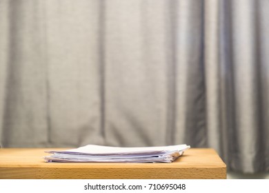 Document on wood table.