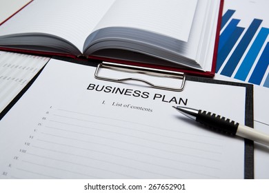 Document with title business plan and office supplies