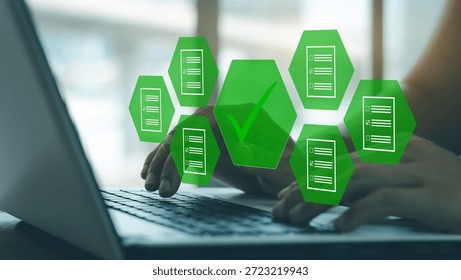 document verification process, check mark concept. A business person using laptop with visual screen on check mark concept.