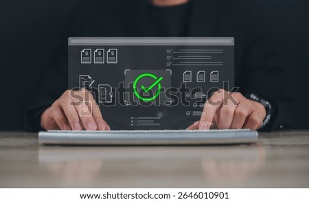 document verification process, with holographic checkmark and contract icons  person using a laptop suggesting technology and innovation in  professional representing online approval and certification
