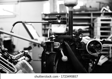 Documentary Photography Of A Commercial Printer: A Heidelberg Offset Printer Detail In A Workshop