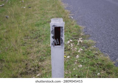 A documentary-style photograph of reflective guide posts installed beside a sealed transport corridor in suburban and regional Australia. Captured in natural daylight, the images showcase durable delineators positioned along grassy verges to improve visibility, define pavement edges and assist motorists with navigation during poor weather and low-light conditions. Their simple cylindrical design and reflective panels demonstrate an important element of traffic guidance and public safety infrastructure used throughout the country. The composition highlights practical engineering solutions that support everyday travel while documenting common features of Australia's transport system. Suitable for civil engineering references, government publications, traffic safety campaigns, educational resources, mapping projects, municipal planning documents, infrastructure reports, editorial articles and transport industry material. The authentic documentary perspective provides commercial and editorial value for projects exploring navigation, engineering standards, public works, regional connectivity, highway maintenance and essential community infrastructure.