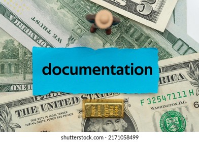 documentation.The word is written on a slip of paper,on colored background. professional terms of finance, business words, economic phrases. concept of economy.