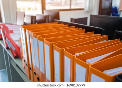 Documents Binder Paper with blank label,Orange Files folder on office desk, Annual Report document for Business papers financial market in offices, lawyer research achieves.Concept work in information
